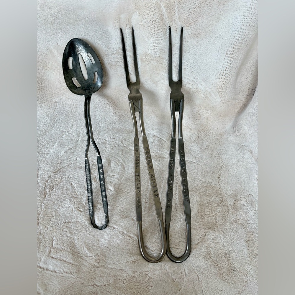 Vintage kitchen utensils with advertising